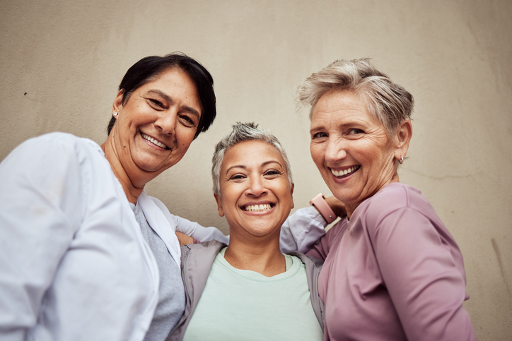 senior women, portrait and group exercise for fitness, workout or happiness of healthy lifestyle together. elderly female friends, sports and training for wellness on wall background for team support