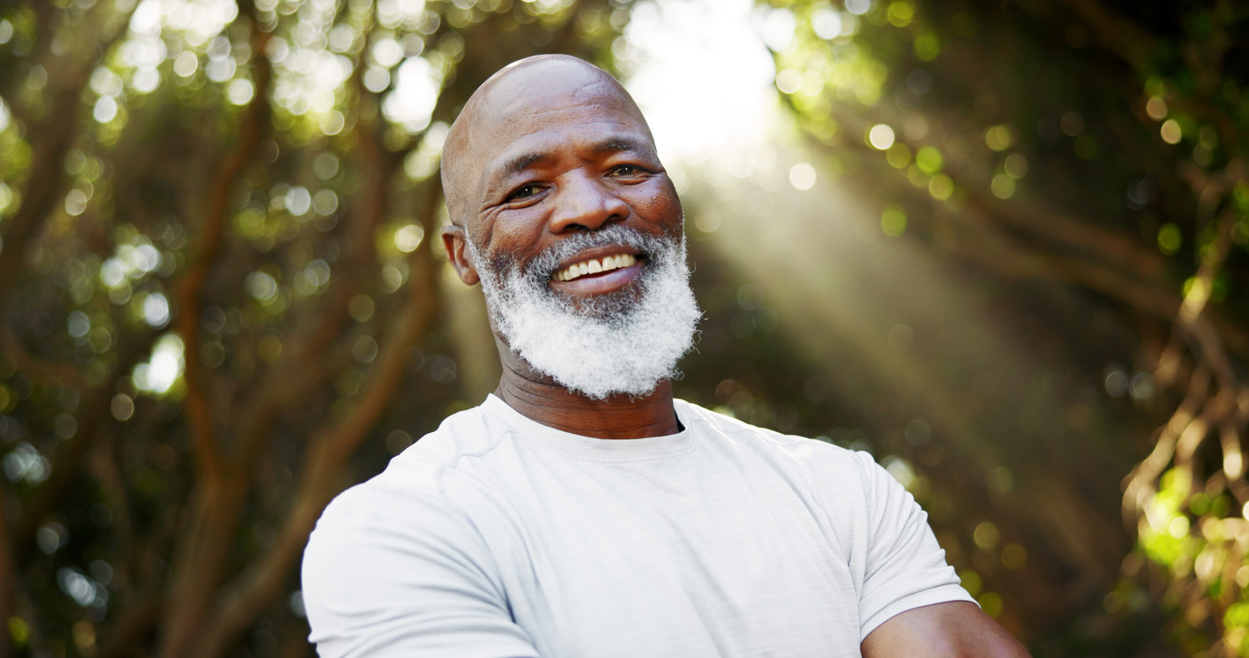 smile, fitness and portrait of black man in nature for runner, confidence and health. retirement, exercise pride and wellness with senior person outdoor for mobility training, sport and hobby